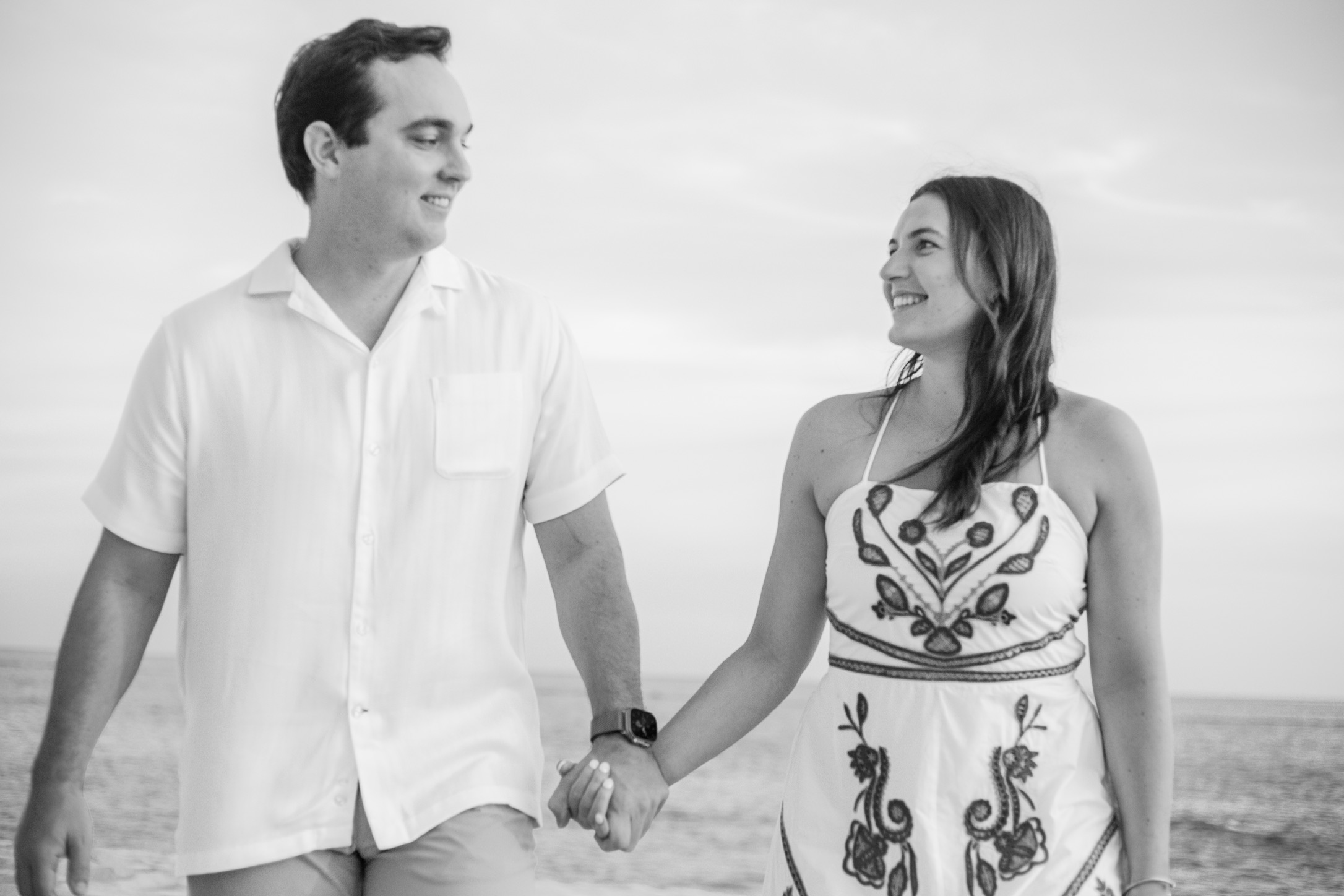 Gianna and Nicholas walking on the beach